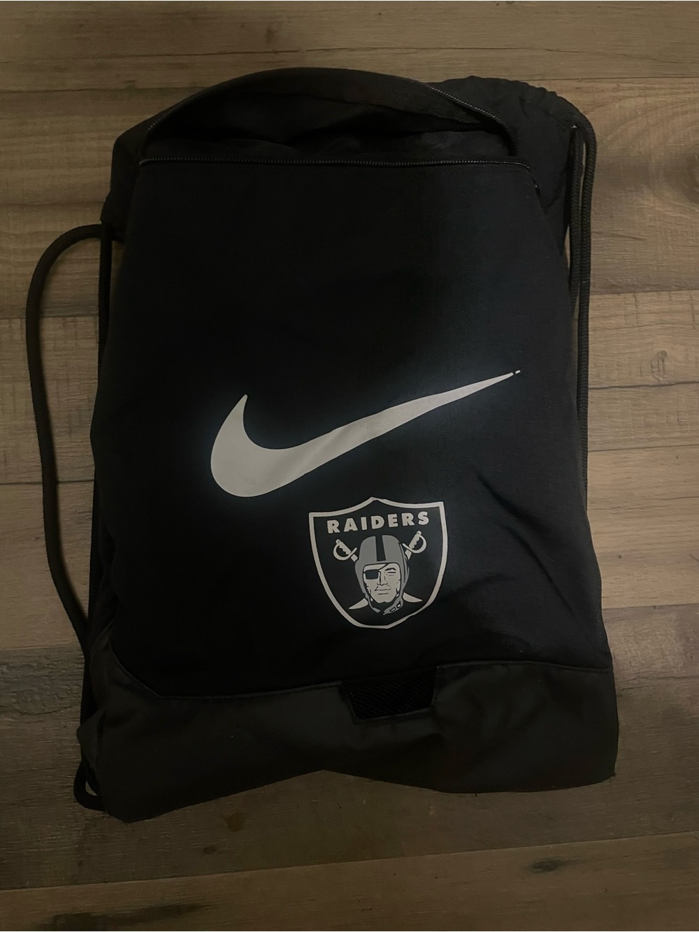 Nike Black Drawstring Backpack with White Swoosh and Raiders Logo